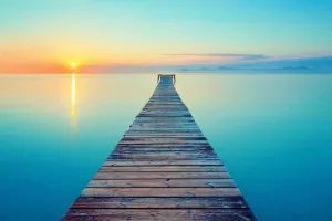 Laminated Peaceful Footbridge Long Pier Dock Over Water at Sunrise Photo Beach Sunset Palm Landscape Pictures Ocean Scenic Scenery Tropical Nature Photography Paradise Poster Dry Erase Wall Art 16x24