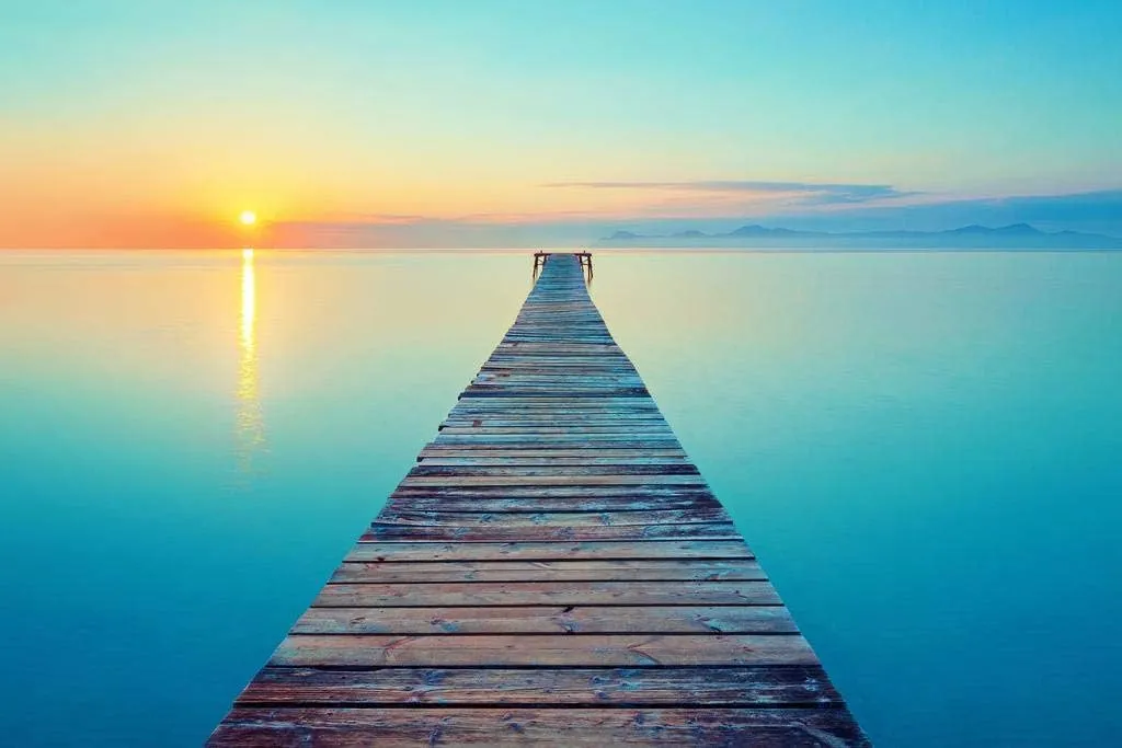 Laminated Peaceful Footbridge Long Pier Dock Over Water at Sunrise Photo Beach Sunset Palm Landscape Pictures Ocean Scenic Scenery Tropical Nature Photography Paradise Poster Dry Erase Wall Art 16x24